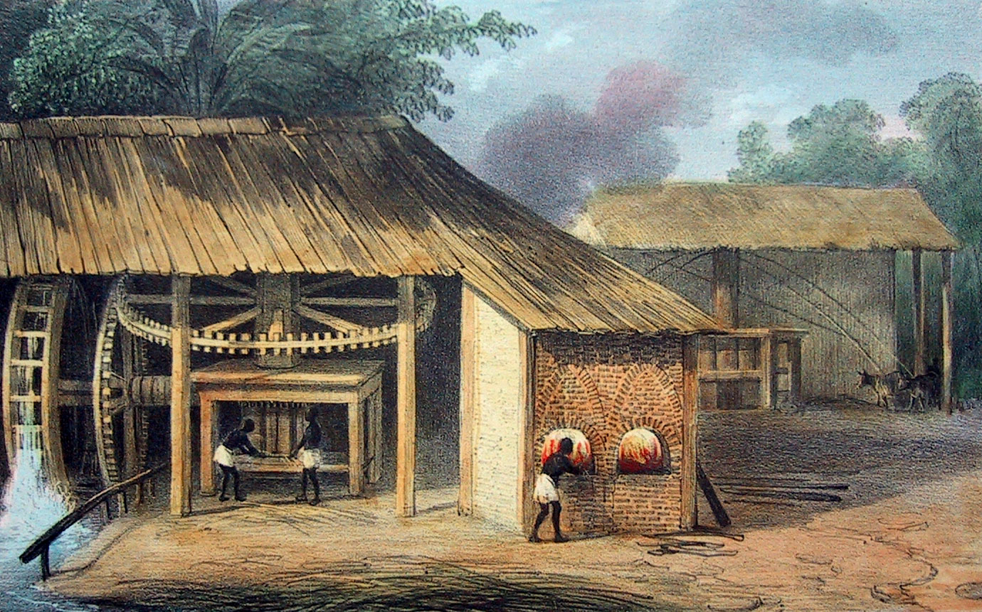 Illustration of sugar milling in Surinam, 1831. The illustration shows two open huts, one in the foreground and one in the background. In the foreground, water turns a waterwheel, which turns large, possibly wooden, gears, which in turn turn vertical rollers. Two people are feeding sugarcane into the rollers. Two the right, another person is appears to be stoking fires in a brick furnace. In the background, animals are attached to another set of rollers by long poles. The animals walk to turn the rollers.