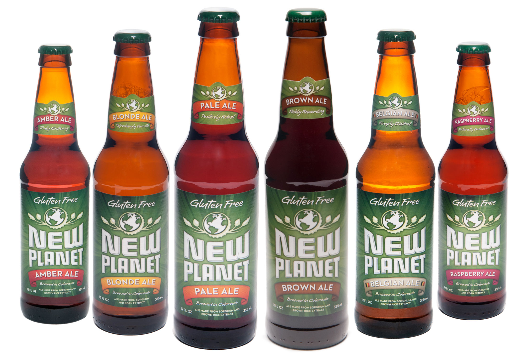Photograph of six bottles of New Planet brand beer. The beers all have labels that say "gluten free" at the top. 
